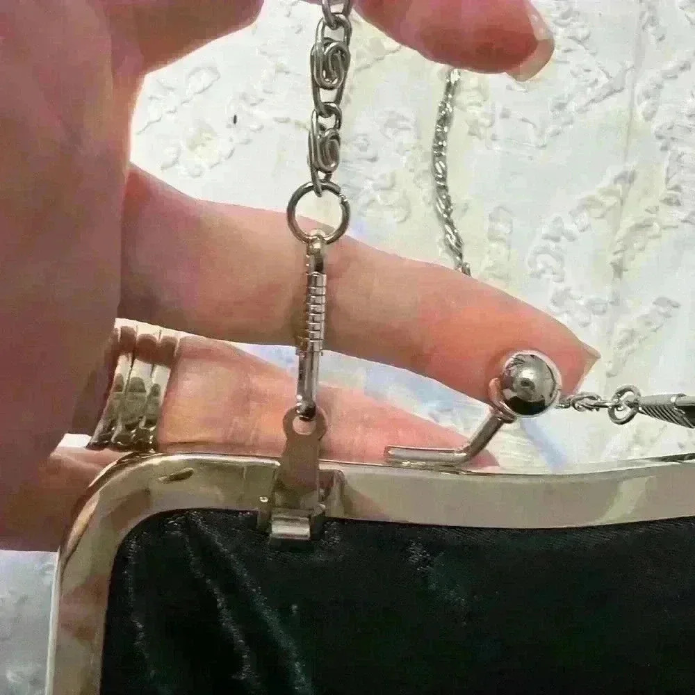Purse perfect for a wedding or date night. Black with silver accents. - Picture 3 of 8